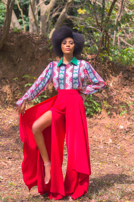 The Cynthia Abila designed Rayha pant is designed with the modern woman in mind. Stylish, playful yet easy to wear. The pant features exaggerated bold side attachment and a side slit. Boasts of a waist band and concealed side zip.   It can be paired with the Krukrubite shirt as seen in the picture or with any top for a seamless transition from work to leisure.